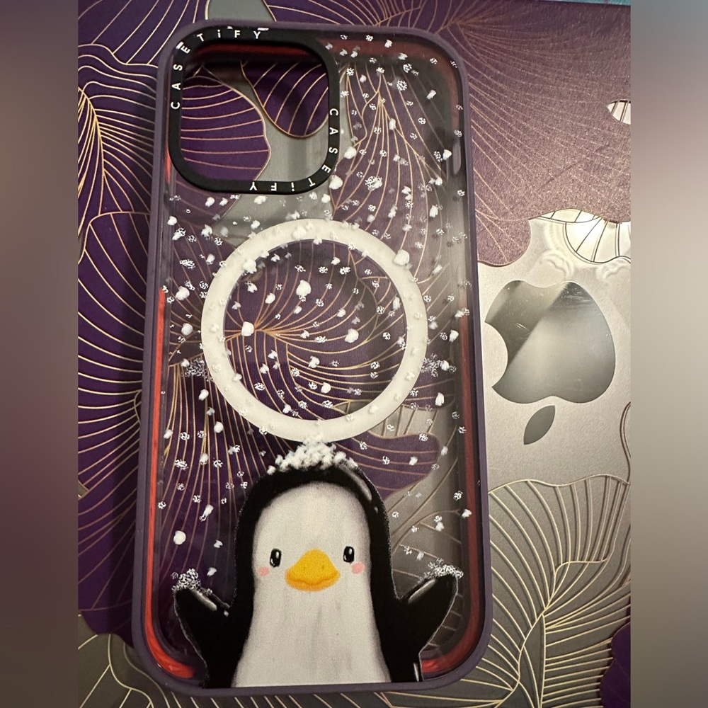 Cute penguin in snow iPhone 14 Pro Max